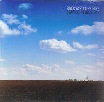 Backyard Tire Fire - Black Dirt Blue Sky